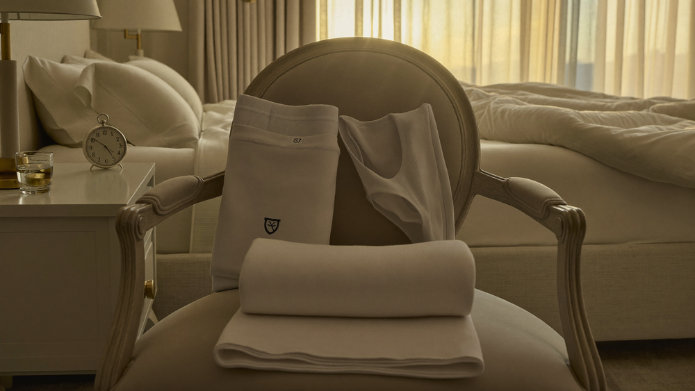 Workout set laid out over a chair in soft dawn light — the moment mental fitness decides