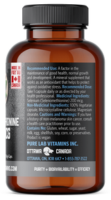 Brown supplement bottle with label on a black background