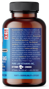 Brown supplement bottle with blue label on a black background